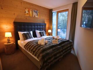 11. Catered chalet Stratus Sankt Anton Moderne kamer